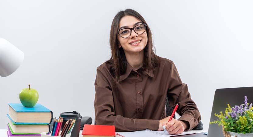 She is making notes on how to make accounting voucher entries company 4.