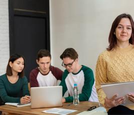 Group of students learning web development