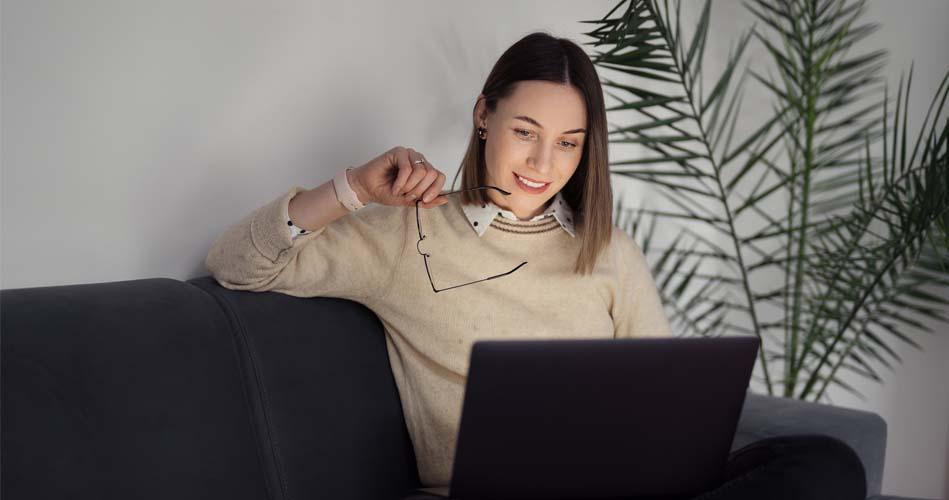 Girl working on laptop about Diploma In IT Infrastructure, Systems And Security