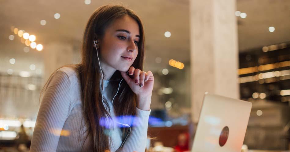 Girl learning online about Java Web Services