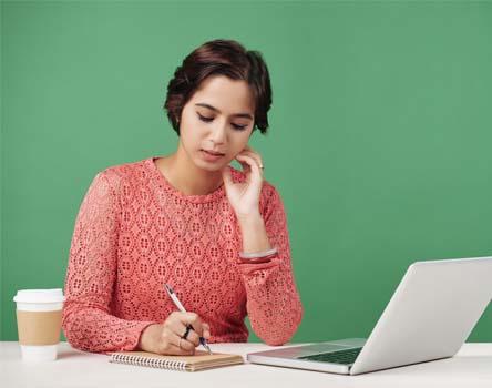 Girl Making notes on Linux course