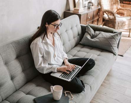 Girl working from home for Tally Prime course